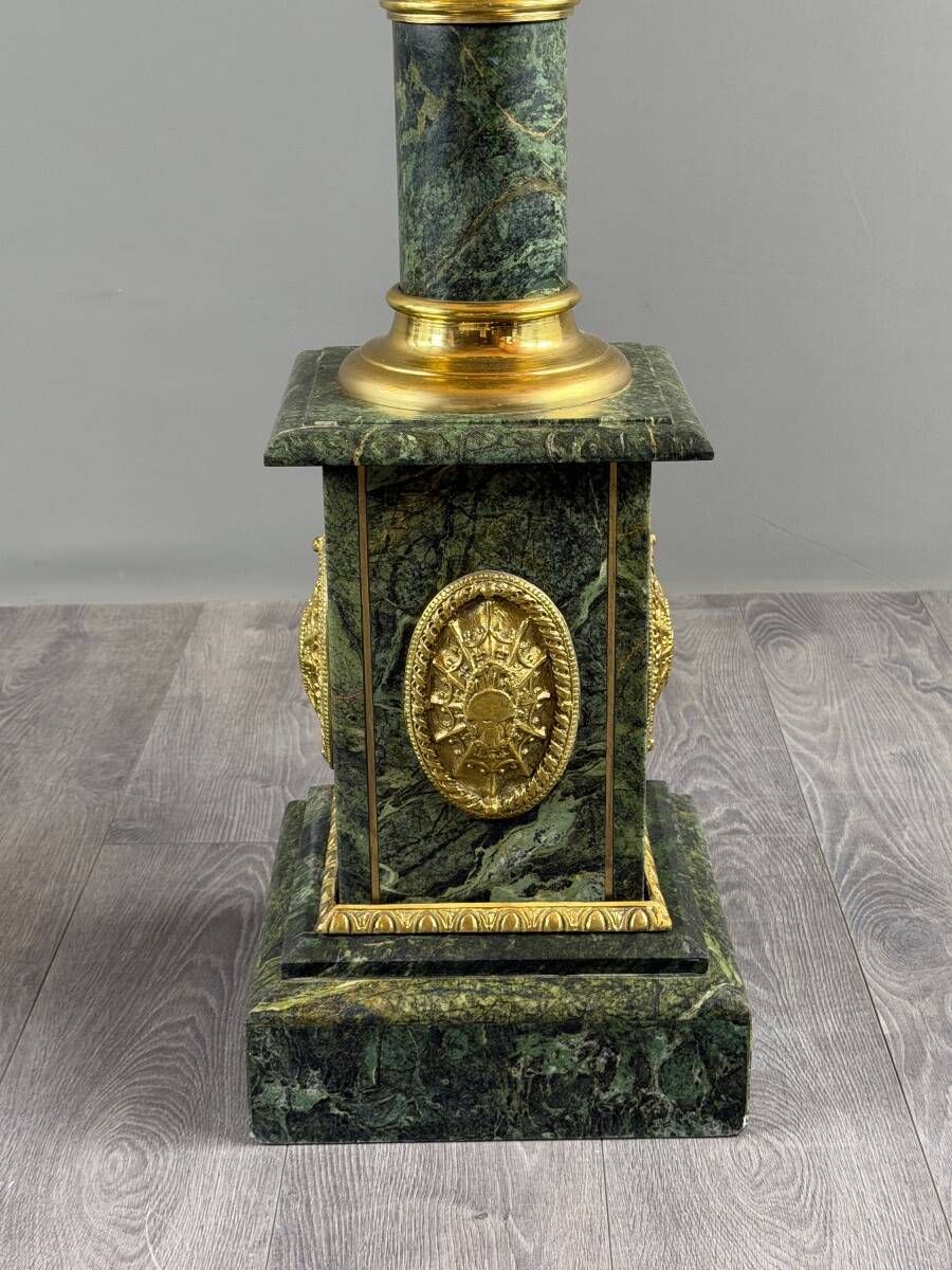 Pair of green marble columns, gilded bronze and gilded brass, 20th Century