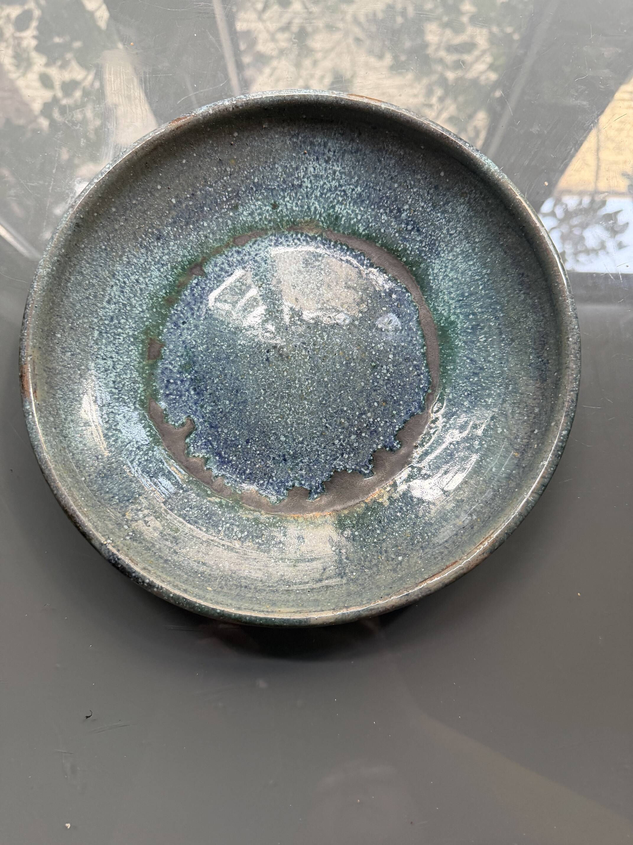 Stoneware plate signed J. Brisy