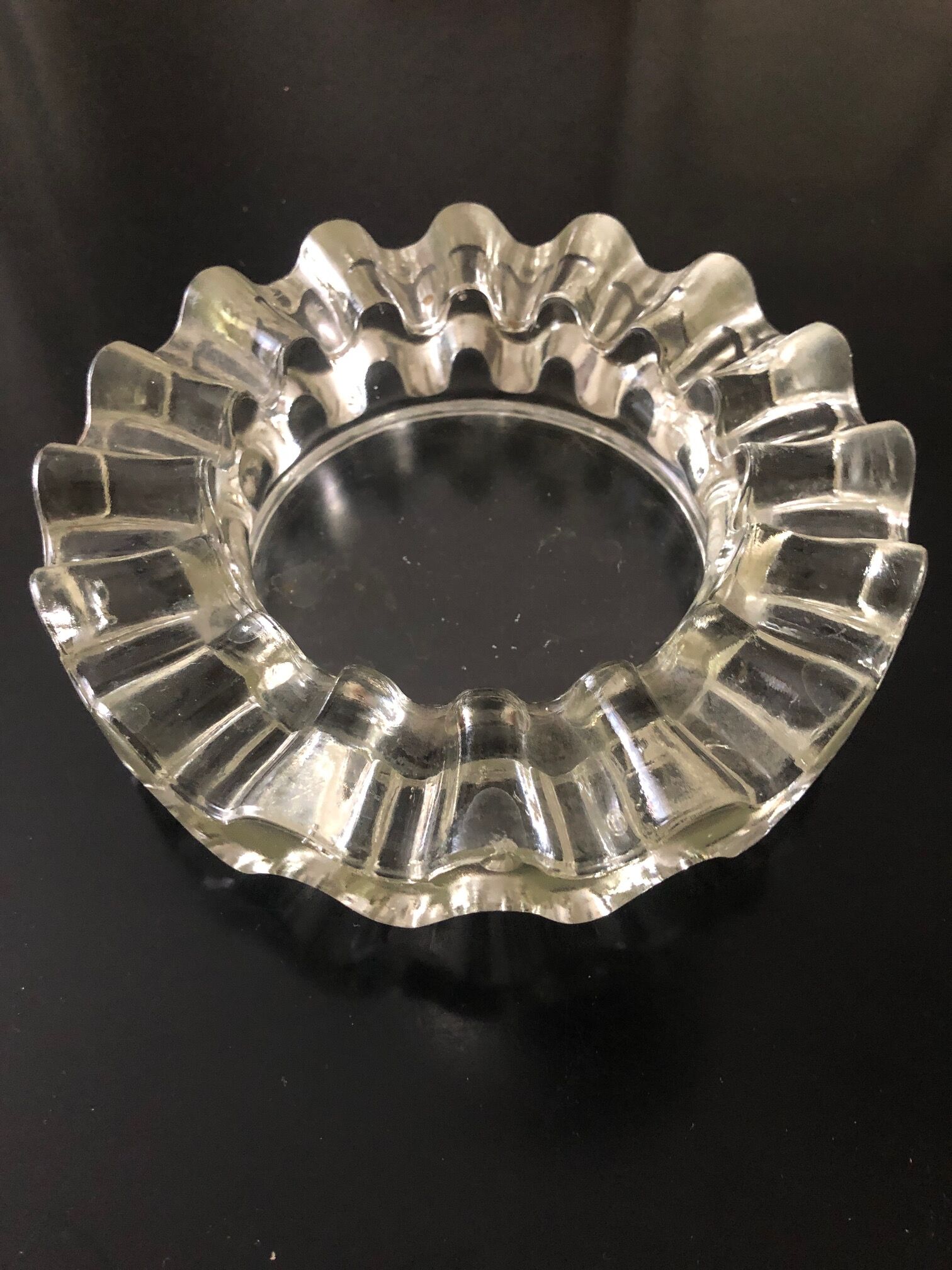 Curved glass ashtray