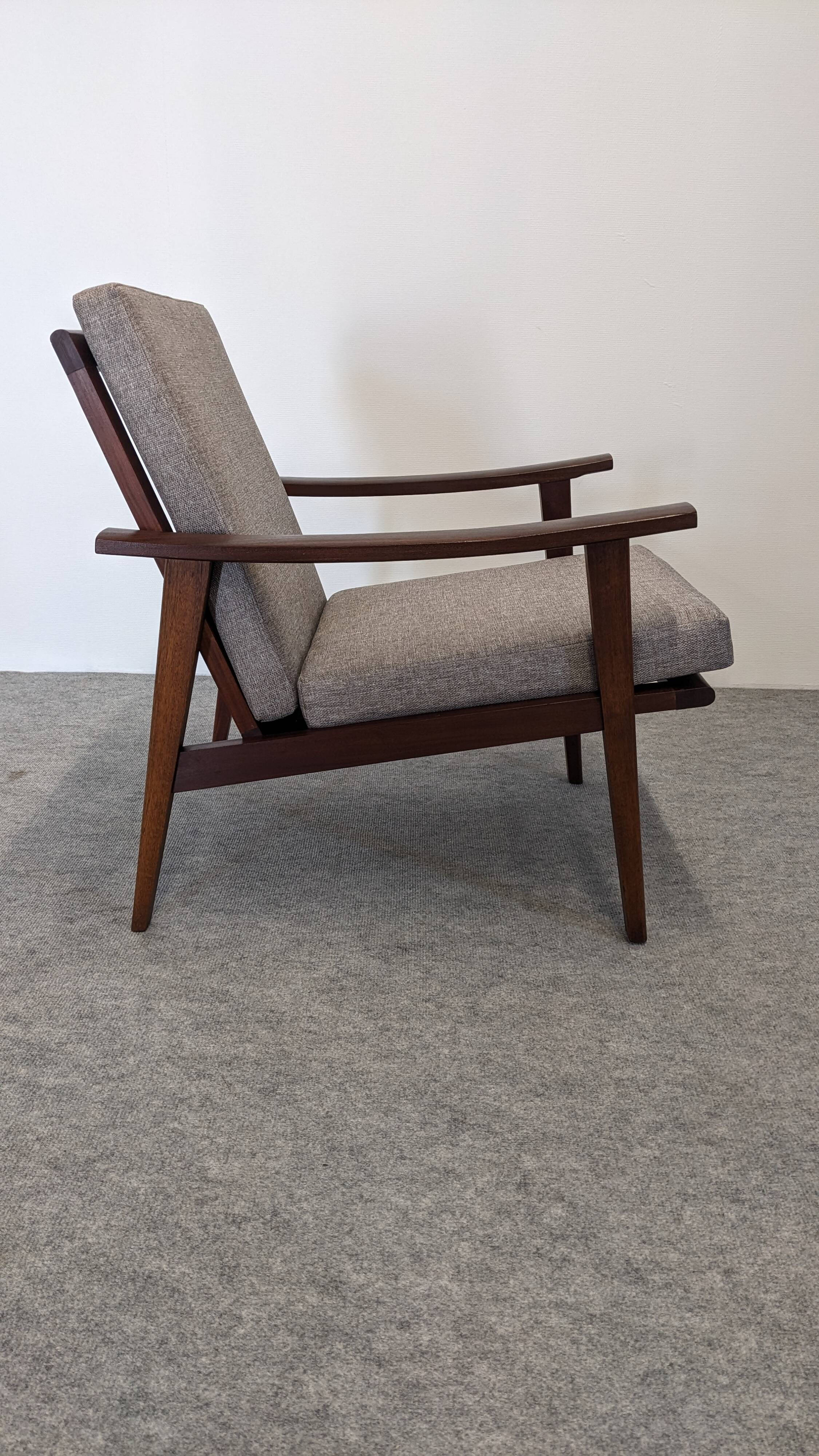 Scandinavian style armchair in teak, Eastern Europe around 1950.