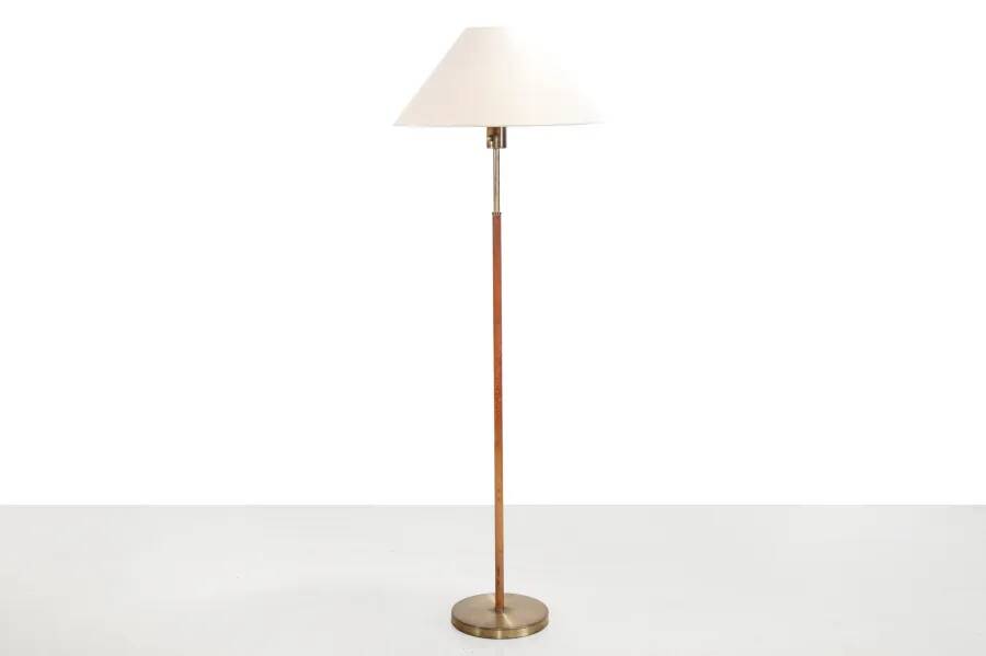 Paavo Tynell style floor lamp in brass and leather with linen shade