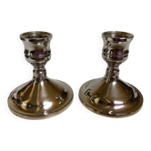 Pair of small silver metal candlesticks England