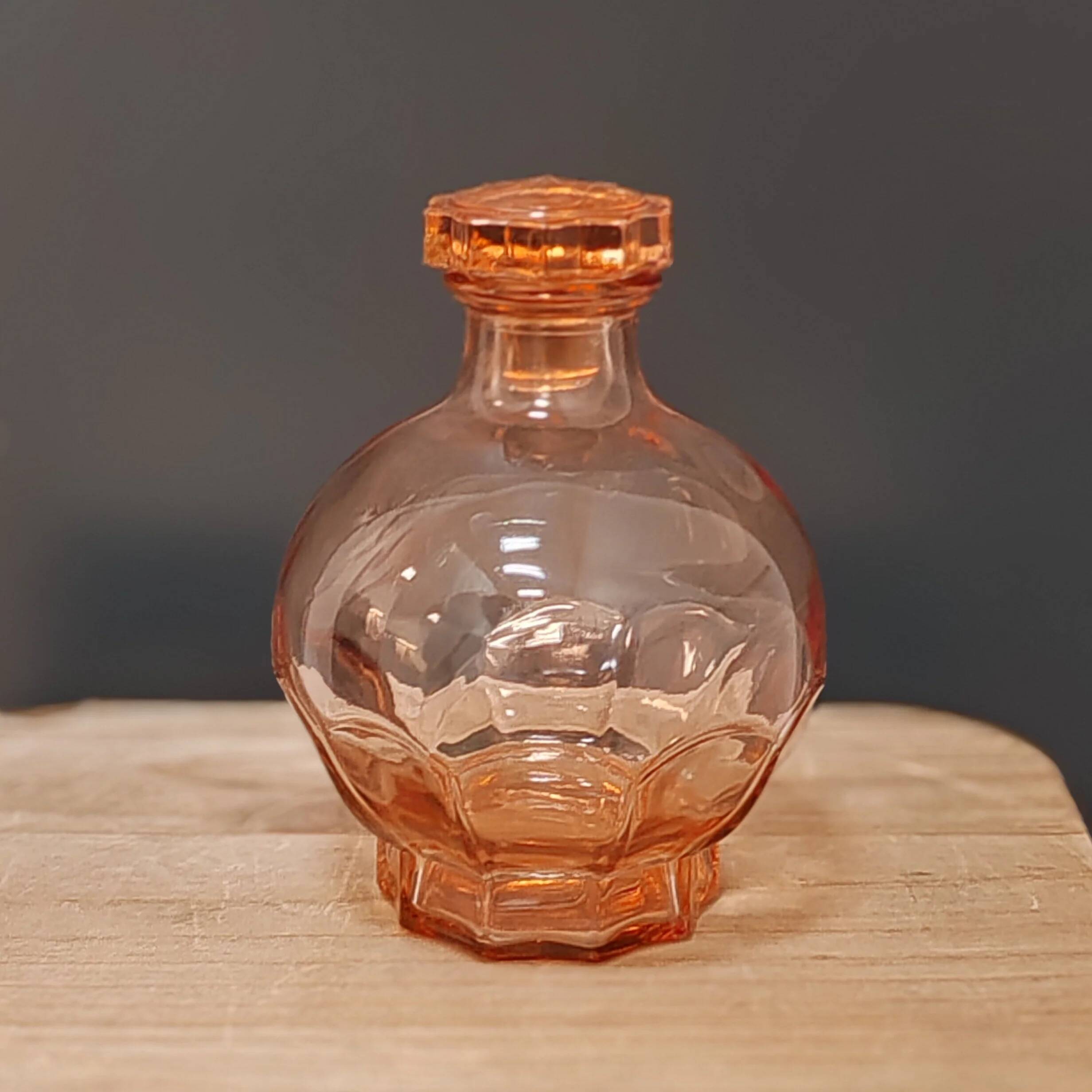 Small pink glass carafe