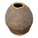 Old basket, burgundy straw and bramble, woven basket, interior decoration, pantry, flowerpot