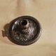 Bronze cellar rat hand candle holder