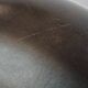 Fauteuil club noir/gris en cuir de mouton