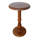 Round pedestal table in solid wood