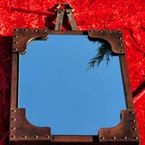 Leather-covered wall mirror attributed to Jacques Adnet 1950