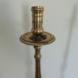 Pair of bronze and brass torch candlesticks