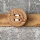Vintage 1980 coat rack with 3 "button" hooks.