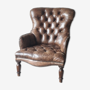 Antique Chesterfield armchair.