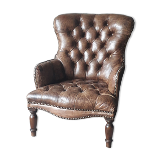 Fauteuil Chesterfield antique