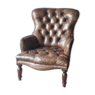 Antique Chesterfield armchair.