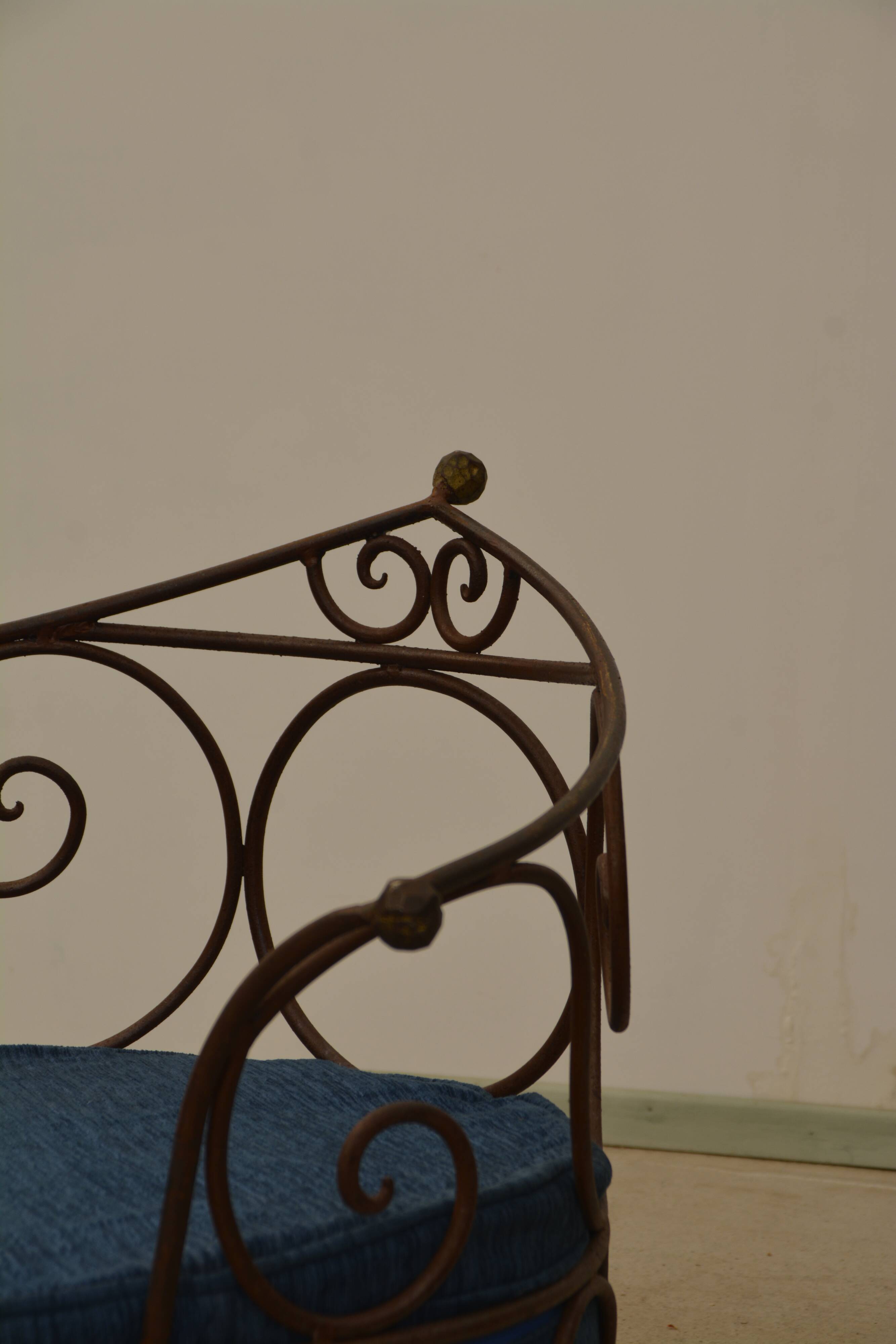 Wrought iron armchairs