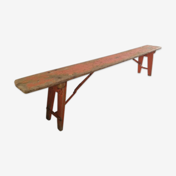 Banc en bois orange pliable