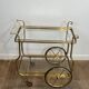 Rolling Table with Large Brass and Glass Wheels, Maison Jansen, Circa 1940