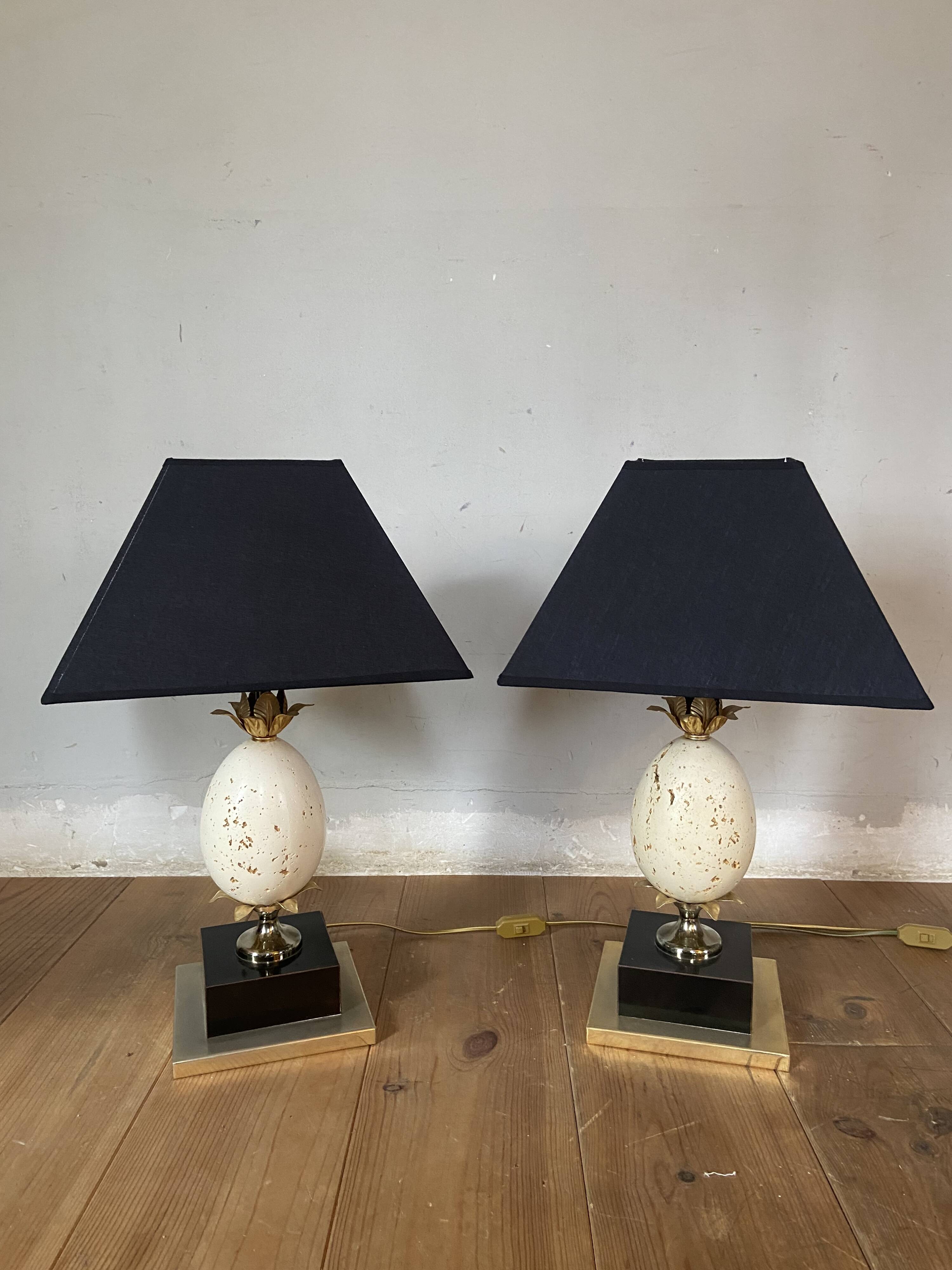 Pair of designer ostrich egg lamps in travertine from maison barbier