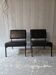 2 faux leather armchairs