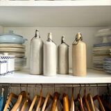4 beige glazed stoneware bottles