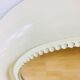 American beige round wall mirror 1970