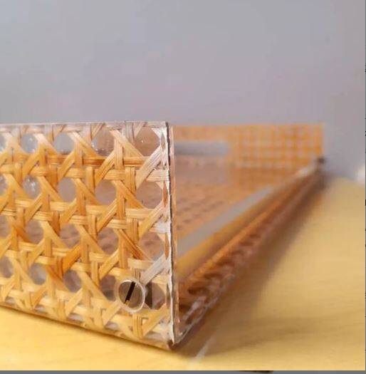 Cane work plateau, lucite and brass 1980