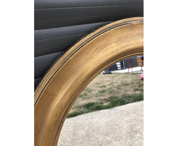 Gold oval mirror 64cm x 54cm