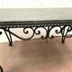 Table basse en fer forgé et marbre XX siècle