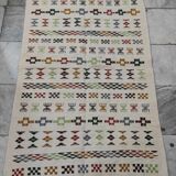 Handmade rugs in natural wool with traditional patterns