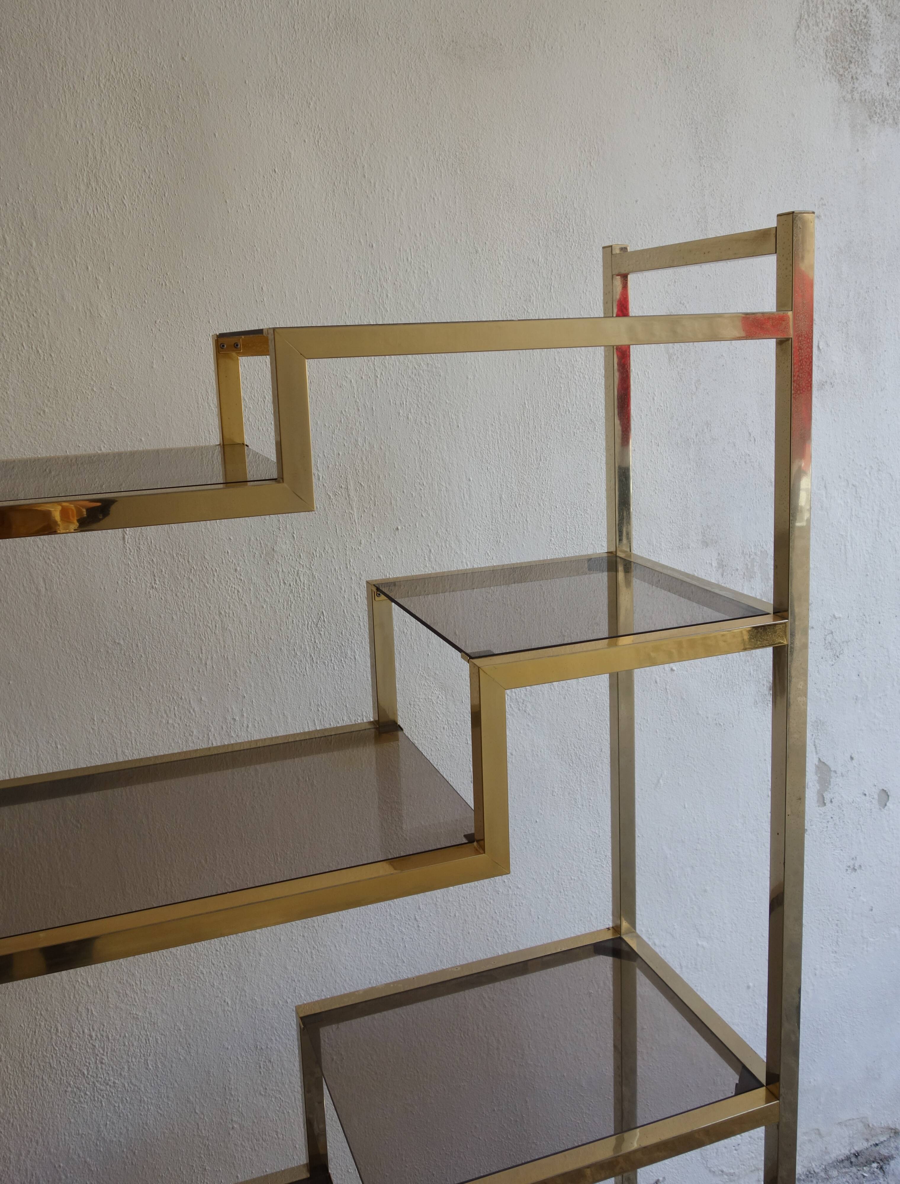 Bookcase or shelf in brass and smoked glass from the 70s