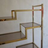 Bookcase or shelf in brass and smoked glass from the 70s
