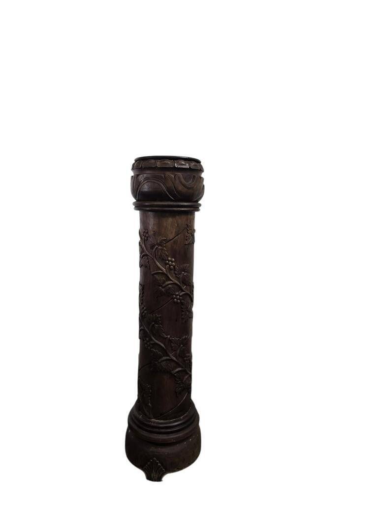 Vintage wooden column with carving