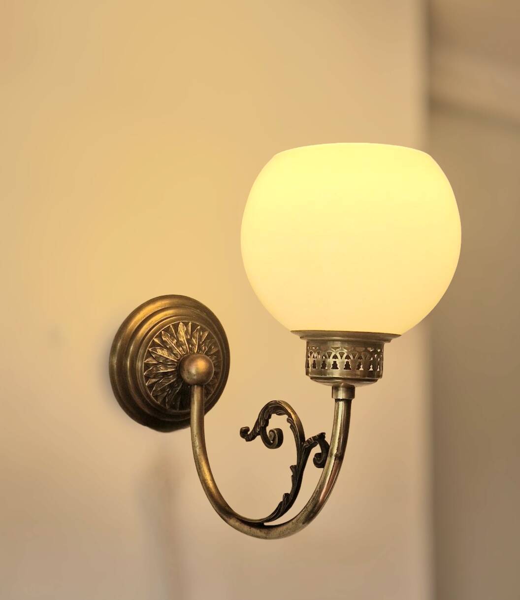 Pair of Napoleon III style brass and opaline wall lights