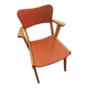 Modernist armchair in wood and orange fabric