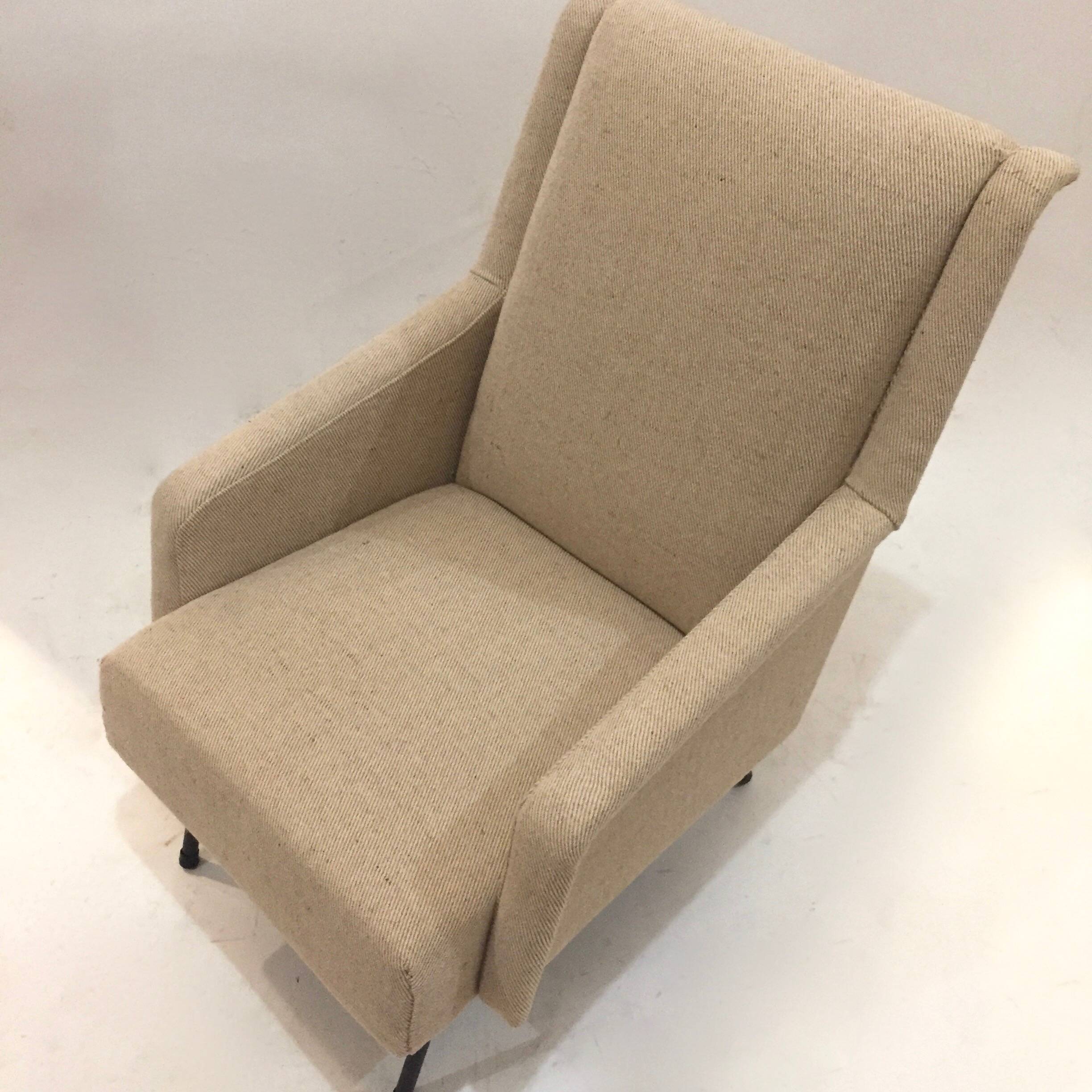 reupholstered modernist armchair