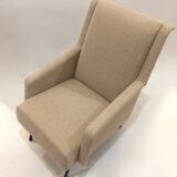reupholstered modernist armchair