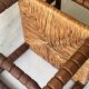 Corner straw chair "fireplace corner" in turned and beaded wood