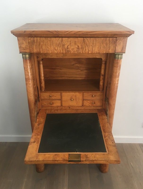 Empire-style secretary desk in burr walnut with detached columns, drop-front, and secret drawer