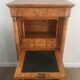 Empire-style secretary desk in burr walnut with detached columns, drop-front, and secret drawer
