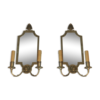 Pair of mirror and bronze wall lamps with lions' heads, french work. around 1940