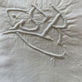 Pair of hand-embroidered SR monogram pillowcases.