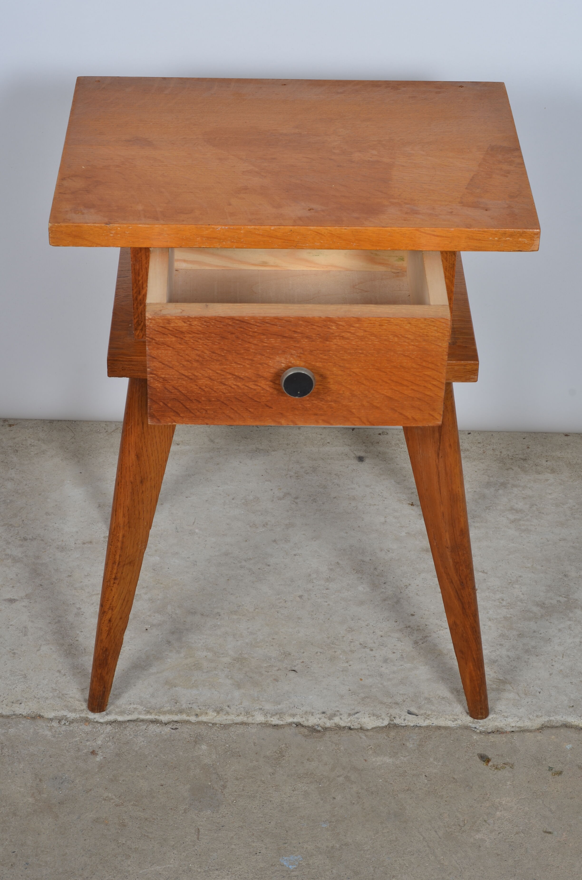 Compass feet bedside table