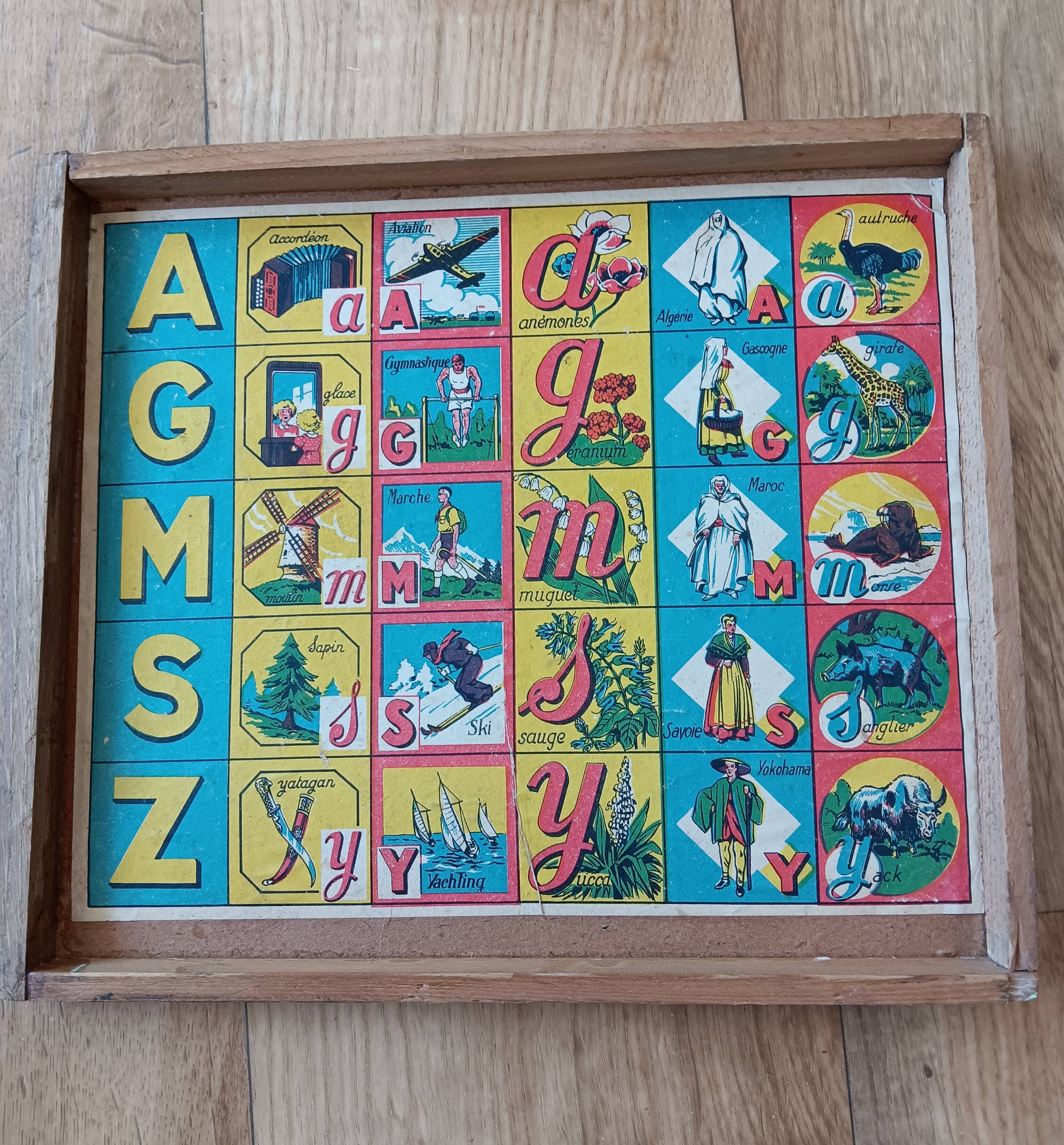 Instructional alphabetical cubes from the early 20th century.