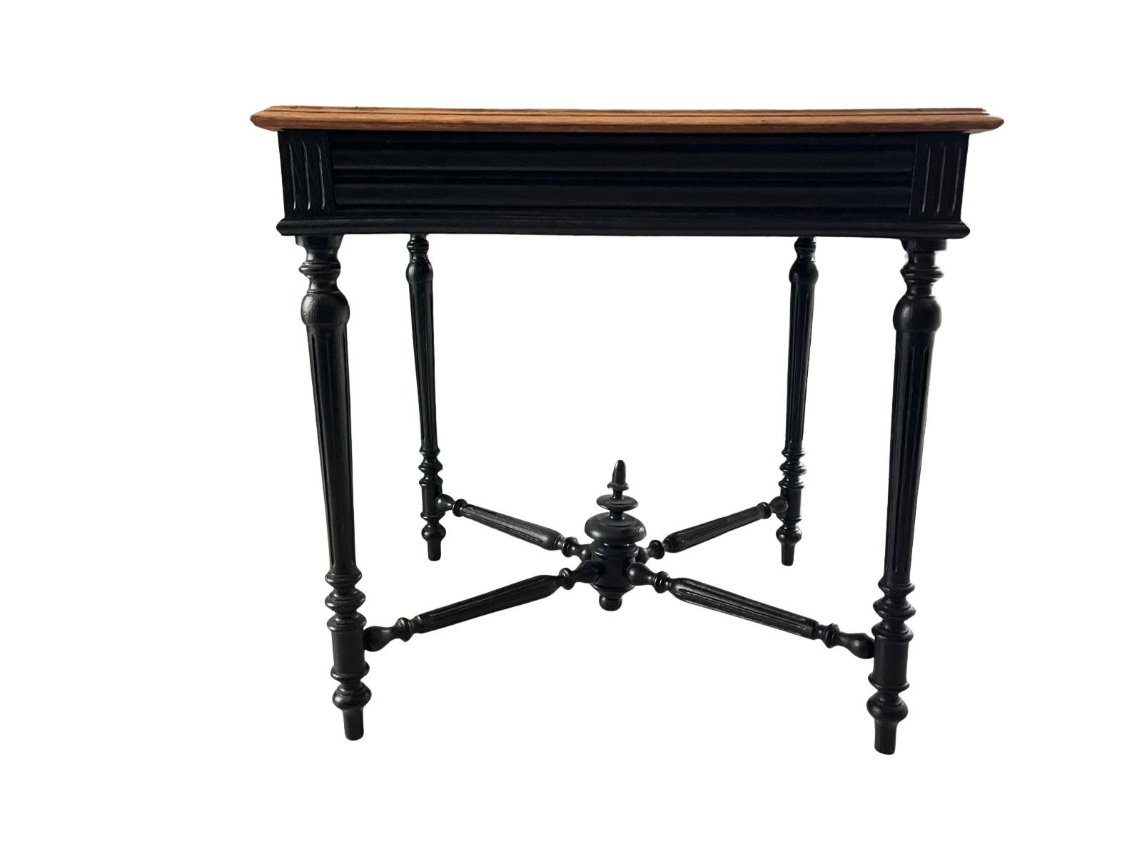 Antique solid wood table, raw top and turned legs.