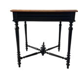 Antique solid wood table, raw top and turned legs.