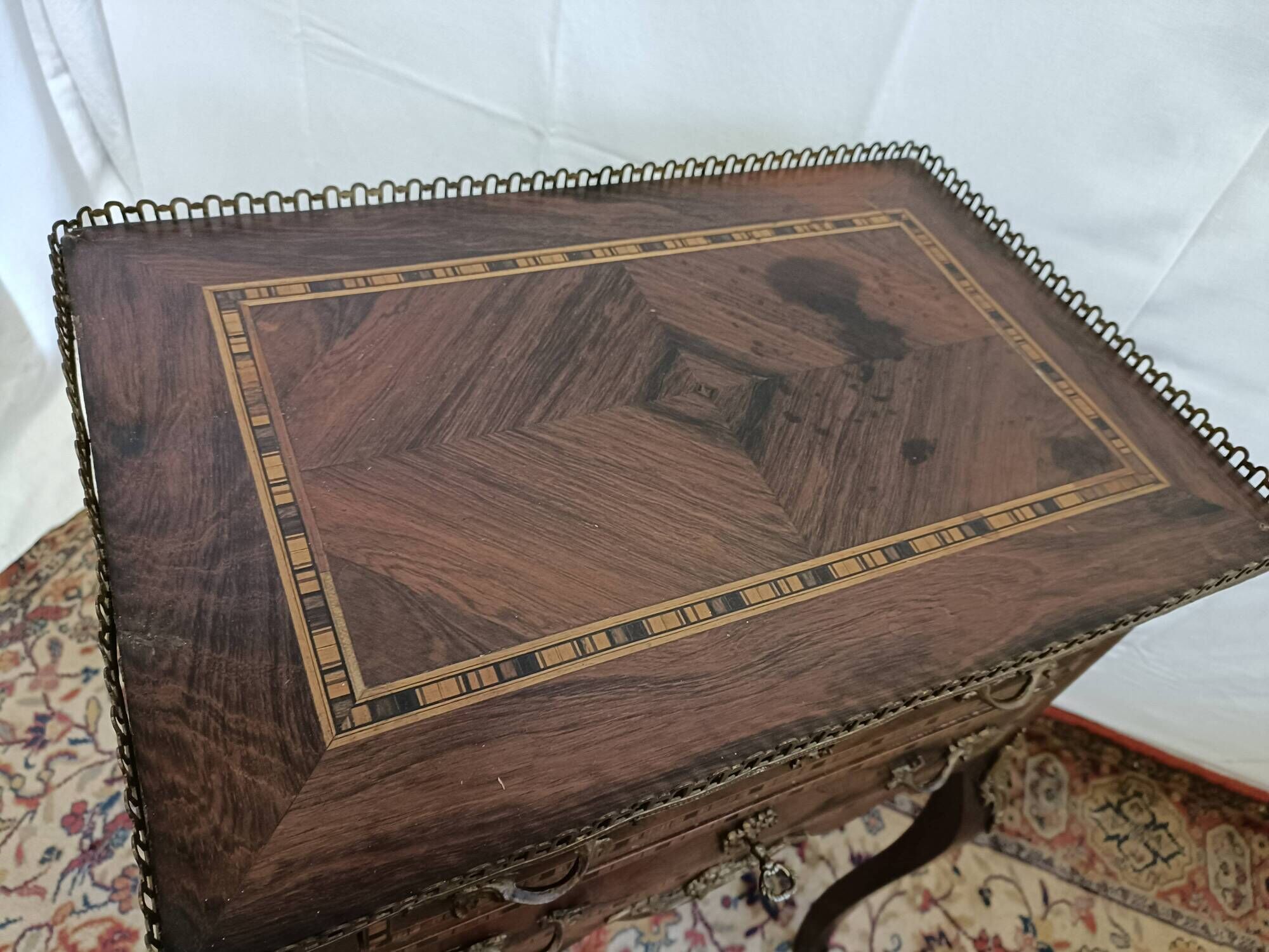 Small Louis XV chest of drawers in inlaid wood