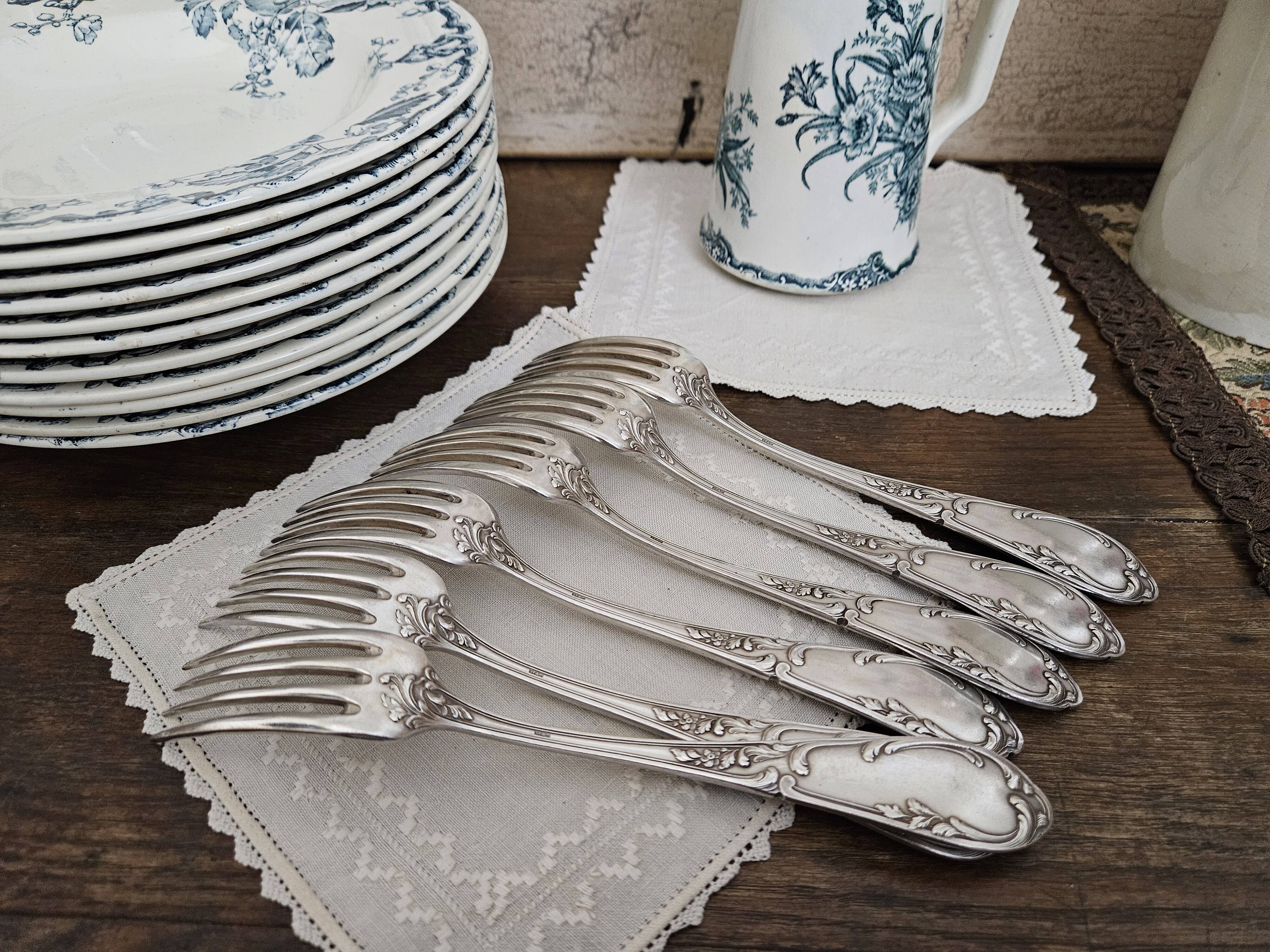 6 silver metal forks