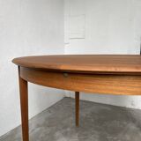Scandinavian round teak table with extension