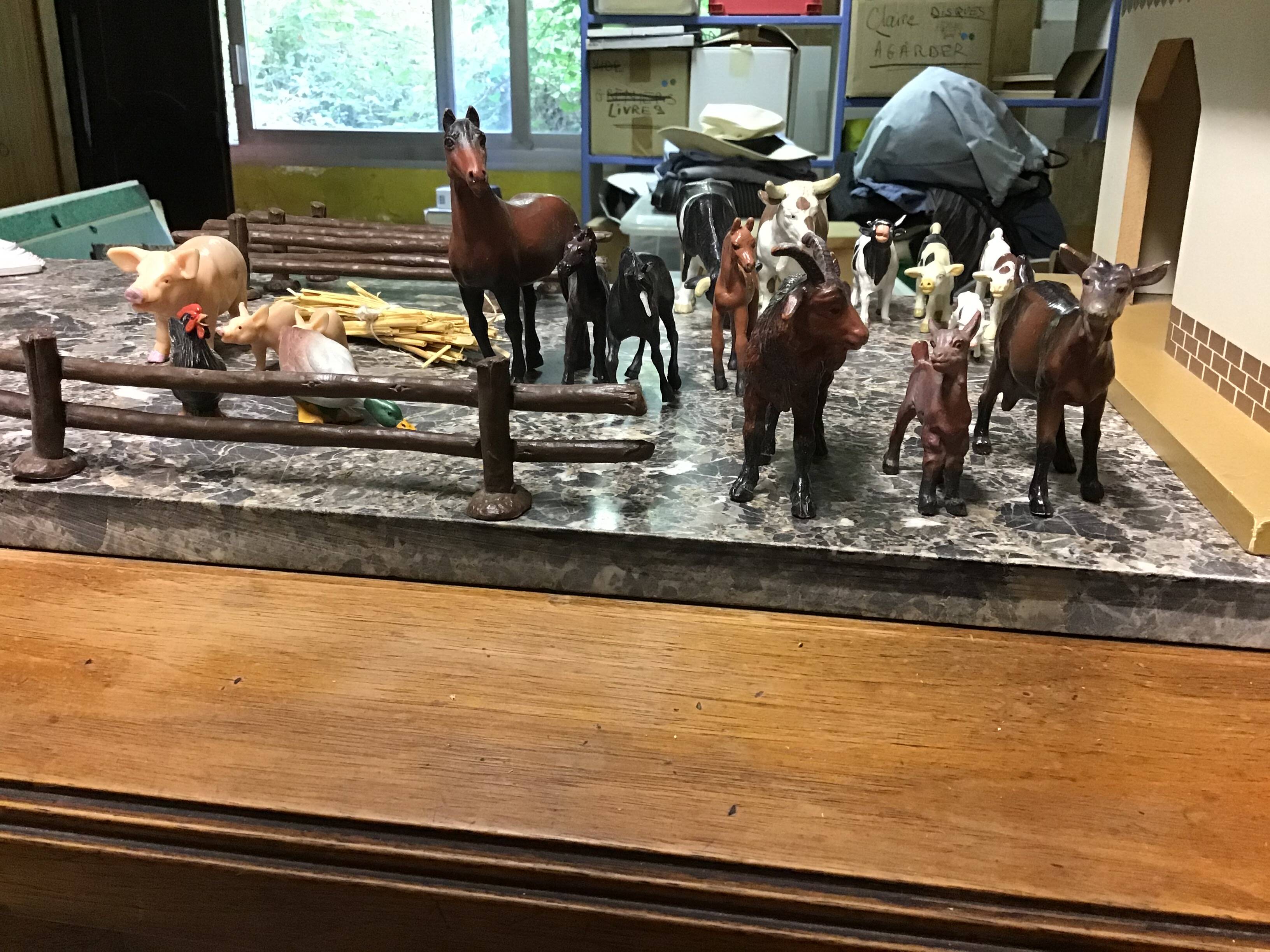 Wooden farm for children with animals.