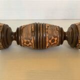 Pair of carved wooden candlesticks