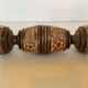 Pair of carved wooden candlesticks